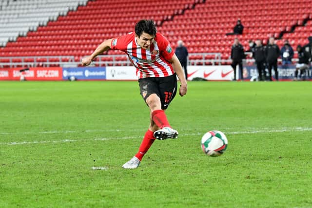 Luke O'Nien scores his penalty in the shoot-out against Lincoln City in the Papa John's Trophy semi-final clash at the Stadium of Light.