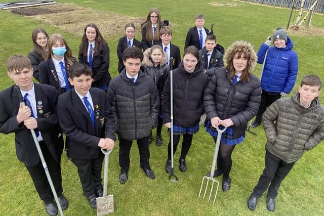 Members of the Sandhill View Academy Eco Club at the school's new Eco Garden.

Picture by FRANK REID