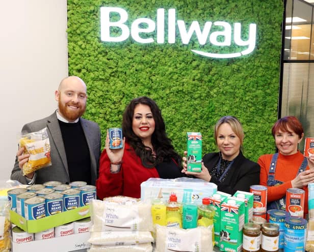 Representatives from Bellway Durham, with Space4 Food Bank Coordinator Megan and Manager Justine