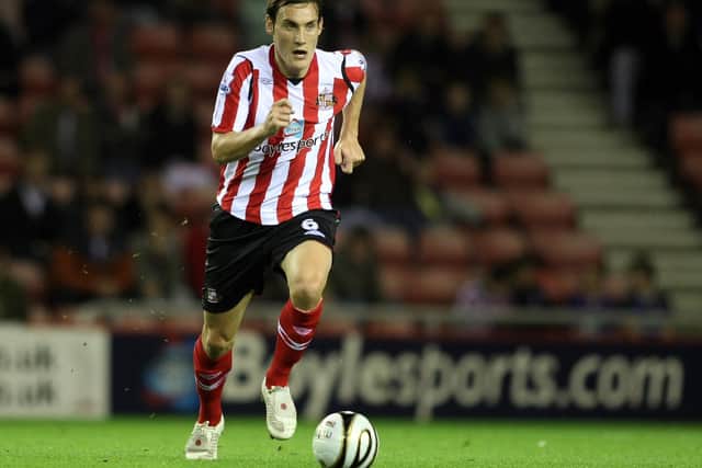 SUNDERLAND, UNITED KINGDOM - SEPTEMBER 23:  Dean Whitehead of Sunderland runs with the ball during the Carling Cup Third Round Match between Sunderland and Northampton Town at the Stadium of Light on September 23, 2008 in Sunderland, England. (Photo by Pete Norton/Getty Images)