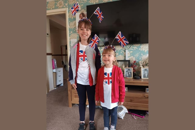 Isabel, age 9, and Charlotte, age 5, in their Jubilee outfits.