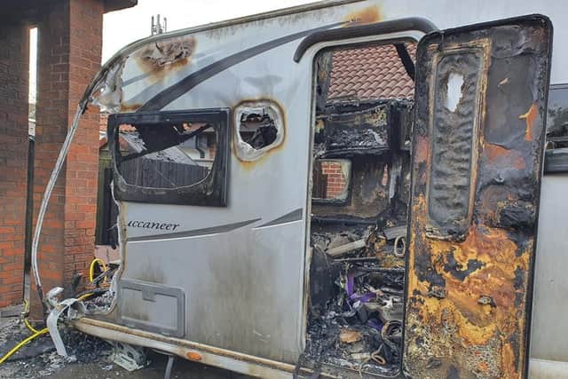 Damage to caravan following the incident.