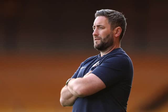 Lee Johnson's Sunderland face Wigan Athletic in the Carabao Cup tonight (Photo by Lewis Storey/Getty Images)
