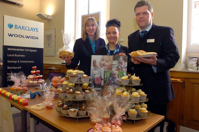 Barclays branch manager Gary Leng (right) was pictured with Mandy Black (left) and Terri Smith as they sold cakes and biscuits for charity in 2013.