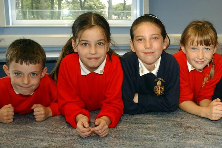 Classmates wait for their school meal at Seaton Holy Trinity Primary School 18 years ago. Who do you recognise in this photo?