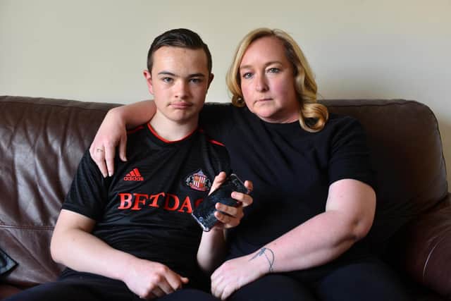 Monkwearmouth Academy pupil Christopher Murphy has been bullied for years resulting in his phone being smashed. Pictured with mum Kathryn Murphy.