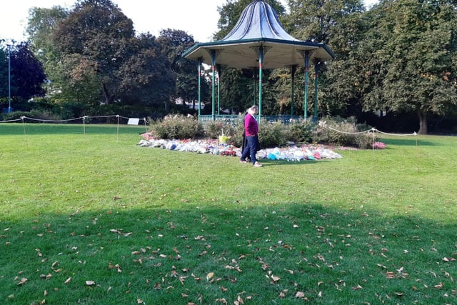 While the presence of people remained sparse, a large number of floral tributes to the Queen had been left in Mowbray Park.
