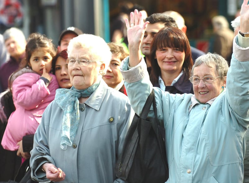 These spectators were enjoying Irish dancing, a hip hop performance and band music in the Market Square in 2009.