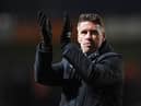 LUTON, ENGLAND - JANUARY 28: Rob Edwards, Manager of Luton Town, applauds the fans following the side's draw in the Emirates FA Cup Fourth Round match between Luton Town and Grimsby at Kenilworth Road on January 28, 2023 in Luton, England. (Photo by Tony Marshall/Getty Images)