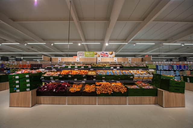 The store has a large fruit and vegetable section.