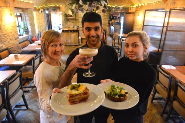 The Forge at The Avenue, Washington. From left manager Kelly Kennedy, bar staff Arjan Sangla and manager Ellie Youll.