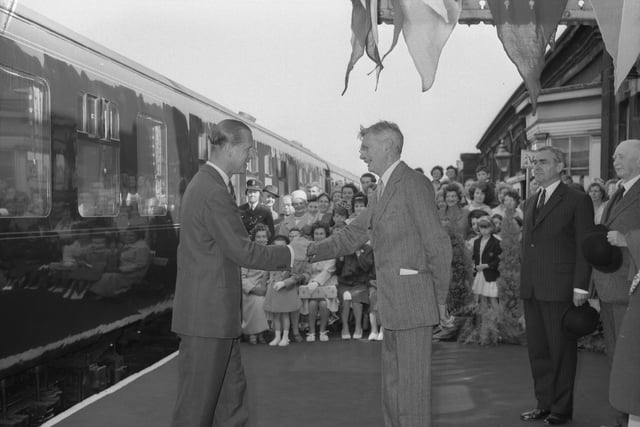 Duke of Edinburgh is greeted by Lord Barnard, Lord Lieutenant of Durham on his arrival at Monkwearmouth Station in July 1963.