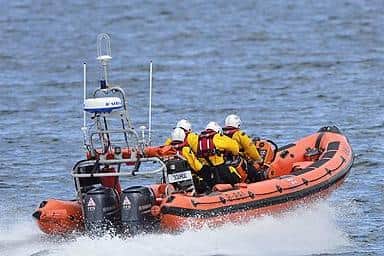 A man had to be rescued by lifeboat crews after injuring his ankle on Easington Beach.