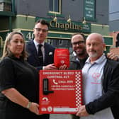 Connor Brown's parents Simon and Tanya Brown with the new Bleed Kit at Chaplins pub with Coun Lyall Reed and pub owner Andy Golding.