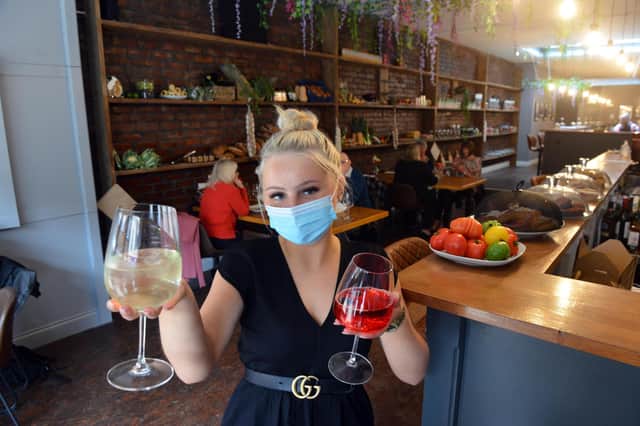 Spent Grain opened its doors for the very first time. Pictured is staff member Lillie Jameson.