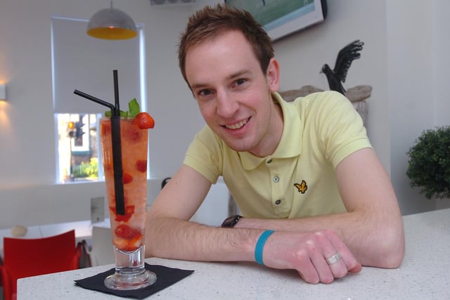 A pink mojito at Bar One in 2009 and assistant manager Jim Maynard looks delighted with it.