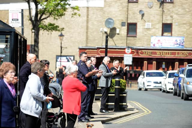 People lined the streets of Houghton town centre to show their respects ahead of the funeral of Sheila Quigley.