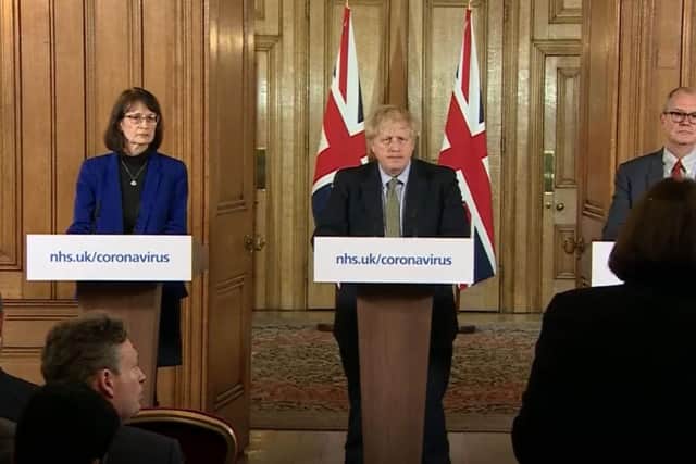 Dr Jenny Harries, Prime Minister Boris Johnson and Chief Scientific Adviser Sir Patrick Vallance, speaking at a media briefing in Downing Street, London, on coronavirus (COVID-19) as NHS England announced that the coronavirus death toll had reached 104 in the UK. PA Photo.