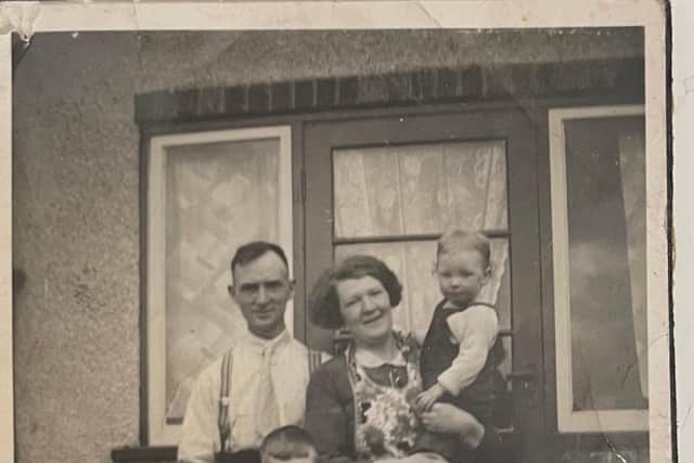 Mr Roberts (pictured, below) as a young boy with his family in Laygate