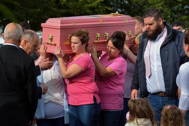 The coffin of three-year-old Kelsey Marie Stokes is carried from St Joseph’s Church in Galliagh after requiem mass for the cousins.