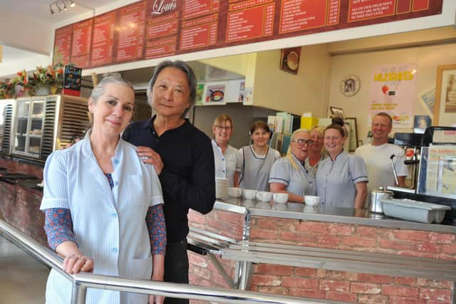 Retiring Maria and Stephen Lee with staff at Louis Cafe in 2018.