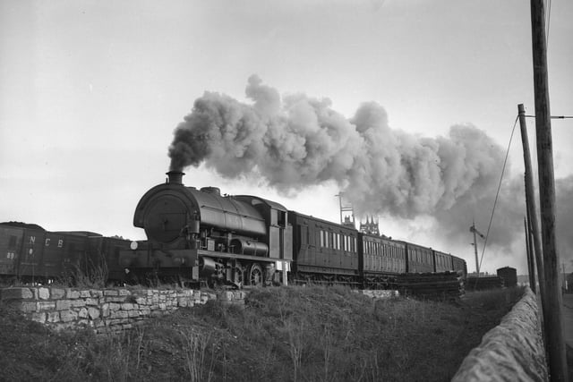 The 'Marsden Rattler' train travelling between South Shields and Whitburn Colliery in October 1953. You might recognise this train if you've seen the Platform 33 bar in South Shields. Can you guess why?