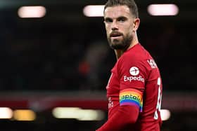 Jordan Henderson captain of Liverpool wearing the rainbow captain armband in support of the LGBTQ+ during the Premier League match between Liverpool FC and Leeds United at Anfield.