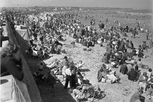 Crowds bask in the sunshine at Seaburn and Roker in 1955. You just can't beat a day at the beach.