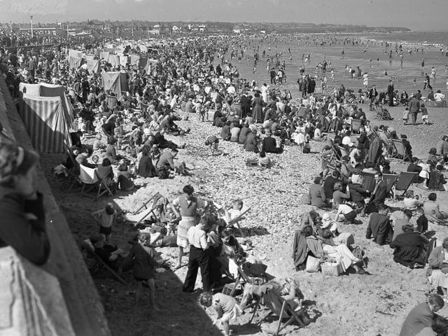 Crowds bask in the sunshine at Seaburn and Roker in 1955. You just can't beat a day at the beach.