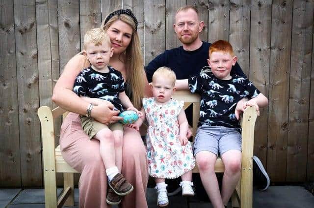 Ashleigh Palmer with her husband Stewart and children Travis, 10, Austin, five, and Felicity, four.