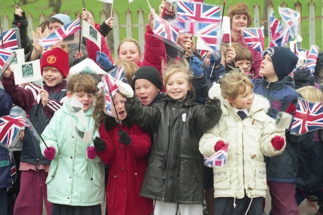 These flag waving children were waiting to see the Duke of Kent who was in the city to visit a major housing development in the Garths and officially open Edwin Trisk Systems at Pallion.