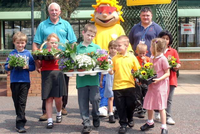 Valley Road School pupils at Clays Garden Centre where they received a donation of plants 16 years ago. Remember this?