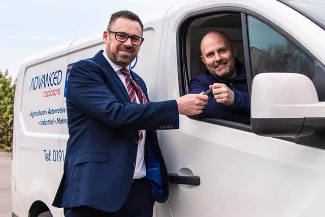 Kevin Parkinson General Manager Nissan Division handing over keys to Mark Riches, Managing Director of Advanced Radiators.