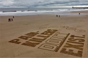 The artwork created by Jax Higginson for the Painkillers Don’t Exist campaign on the sand at Roker.