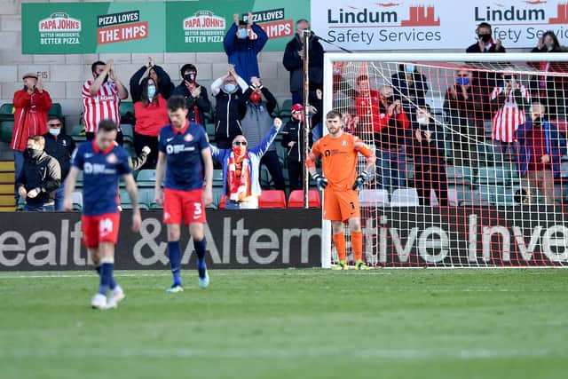 Sunderland goalkeeper Lee Burge looks on after conceding Lincoln City's second goal