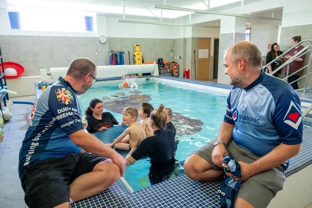 Steve Piercy and Gavin Rowell get to see the work being done by the staff of Heel and Toe in the hydrotherapy pool. Photo credit Keith Blundy.