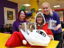 Geek Retreat Christmas toy appeal. From left Gemma Wilkinson, Gillian Pickles from Love Amelia charity and Laura Green.