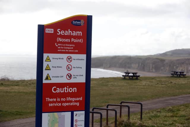 Emergency services were called to Nose's Point after receiving reports of a woman sitting on the cliff edge.