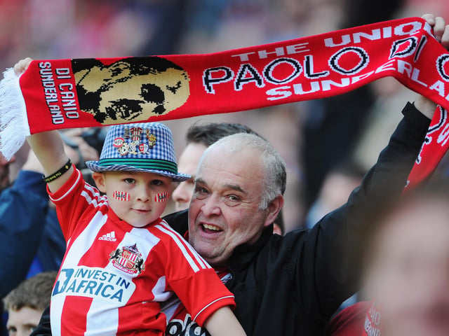 Sunderland fans show their support during the Premier League match between Sunderland and Everton at the Stadium of Light on April 20, 2013.