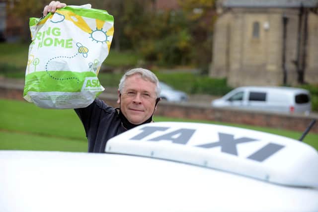 Taxi driver Derek Huntington, of Peterlee Executive Cars, which is "giving something back to the community" over the half-term school holidays by paying for a supermarket shop a day.