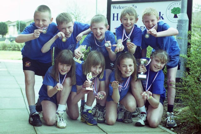 Holley Park Primary School cross country runners pictured 24 years ago were; Left (front): Kirsty Clayton, nine, Justine Gates, 10, Sarah-Jane Anderson, 10, Rachel Freeman, 10, and (back) James Miller, nine, Andrew Wilson, 10, Alex Patton, 10, Ross Drummond, nine and Matthew Noble, 10.