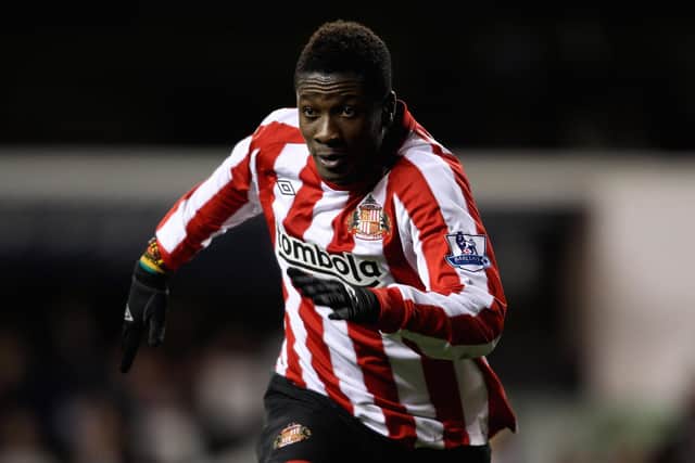 LONDON, ENGLAND - NOVEMBER 09: Asamoah Gyan of Sunderland celebrates after scoring their first goal during the Premier League match between Tottenham Hotspur and Sunderland at White Hart Lane on November 9, 2010 in London, England.  (Photo by Scott Heavey/Getty Images)