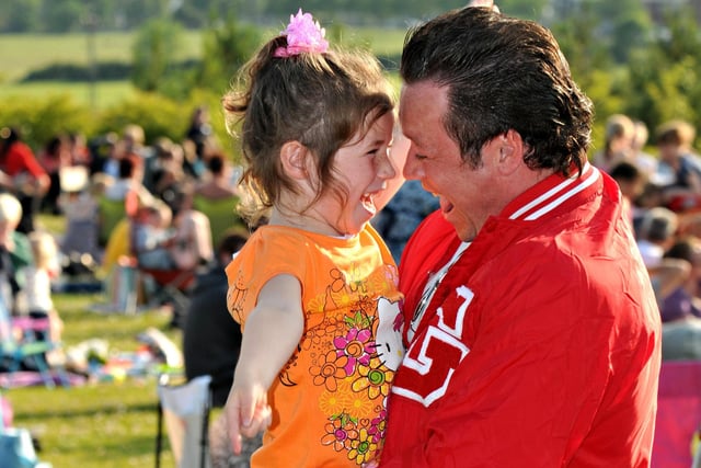 Having a wonderful time at the outdoor showing of Grease in 2011.