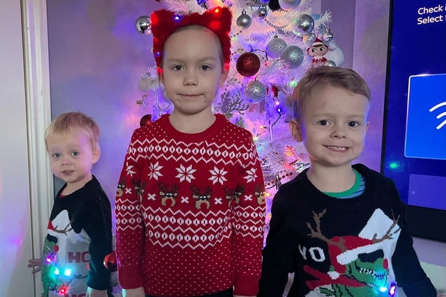 Phoenix, Skylar and River line up for a Christmas Jumper picture.