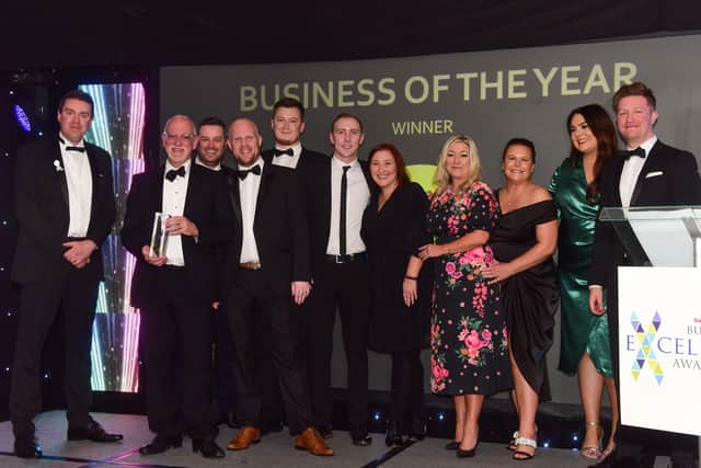 A big night for the Business of the Year Awards winners Hays Travel, who received their award from Coun Kevin Johnston (left).