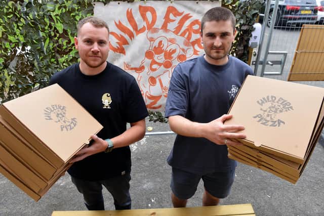 Wild Fire Pizza owners Josh Wild and Joe Collins (R) are now operating from Ship Isis.