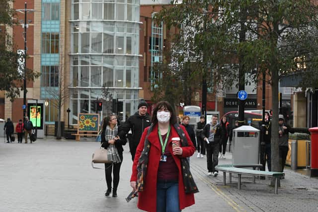 People wearing masks in Sunderland City Centre.