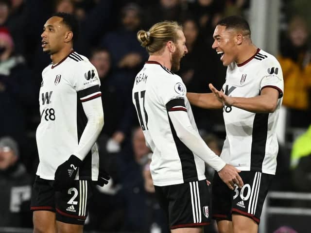 Carlos Vinicius celebrates after scoring for Fulham against Chelsea. (Photo by BEN STANSALL/AFP via Getty Images)