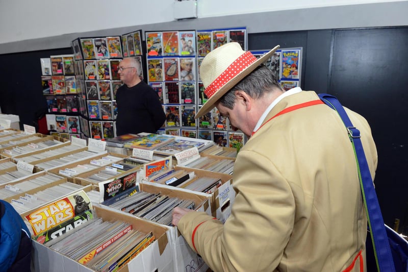 The Fifth Doctor checks out the comics on offer