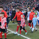 Players and mascots stride out of the Stadium of Light tunnel before Sunderland's recent victory over Reading.